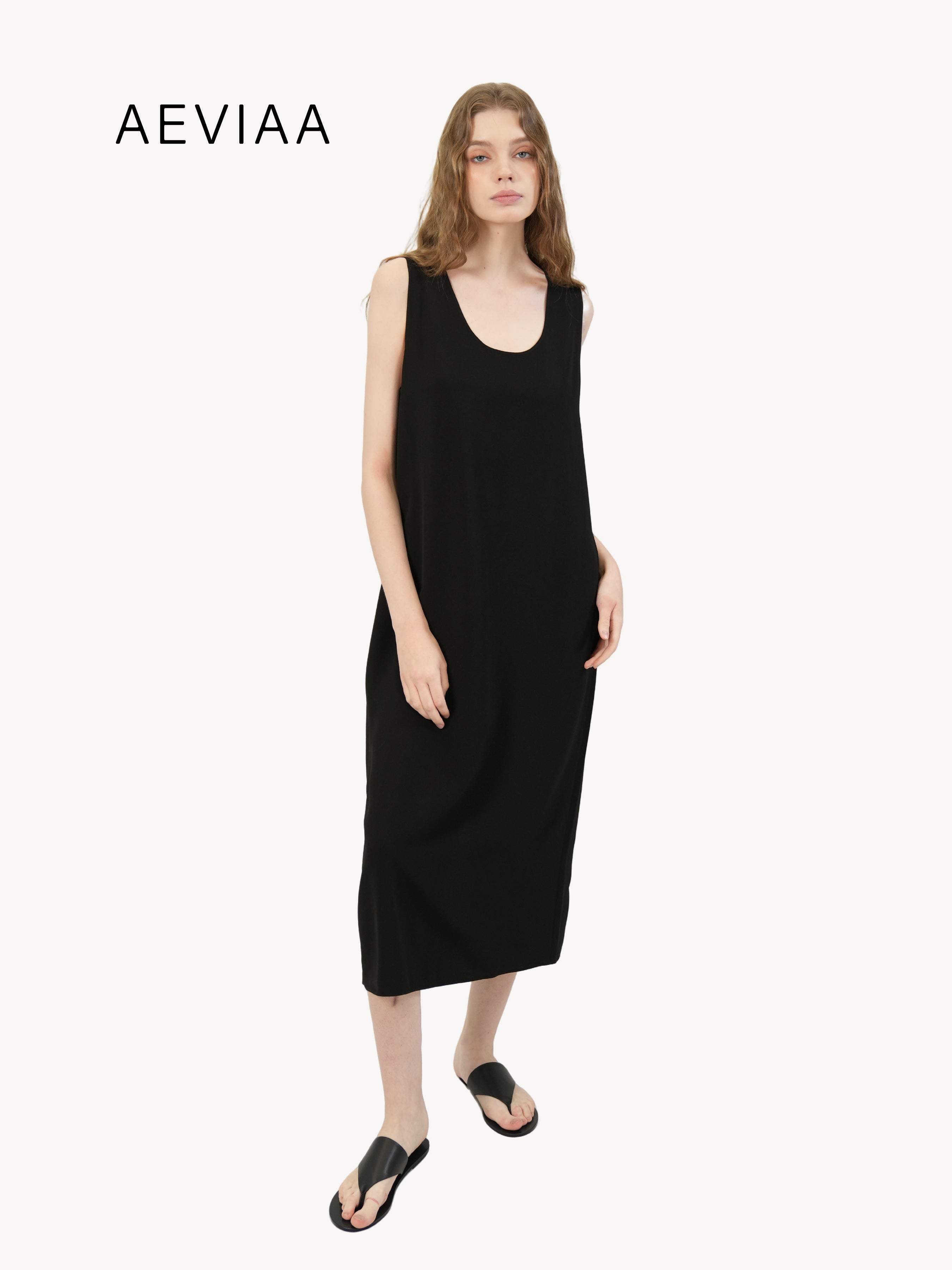 The Sleeveless Midi Dress