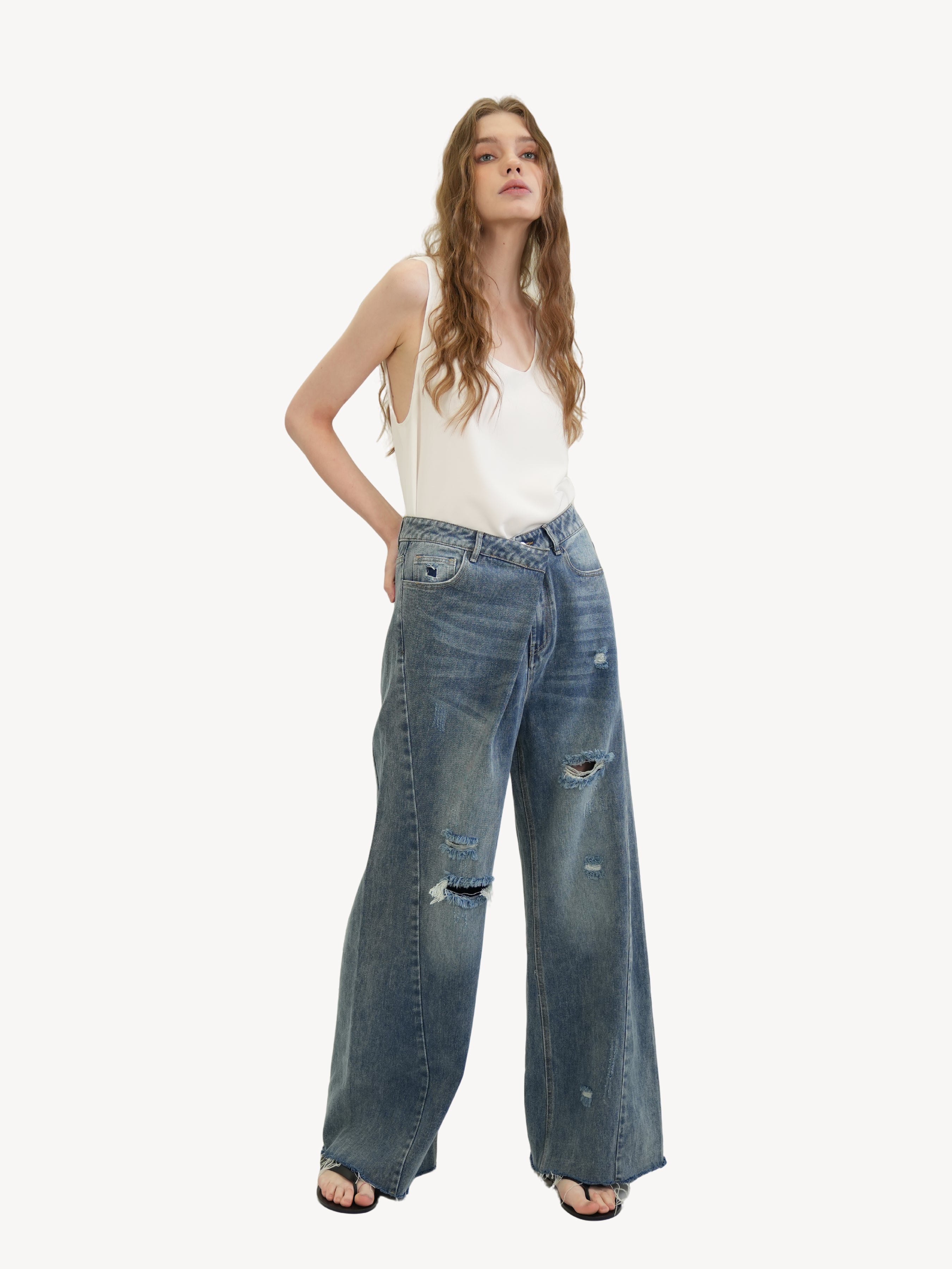 The Distressed Relaxed Jeans